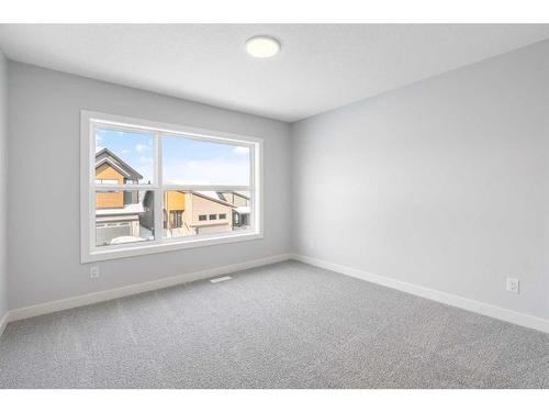 200 Precedence Hill, Cochrane, AB - Indoor Photo Showing Other Room