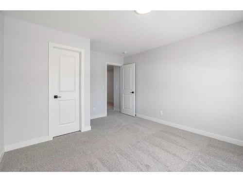 200 Precedence Hill, Cochrane, AB - Indoor Photo Showing Other Room