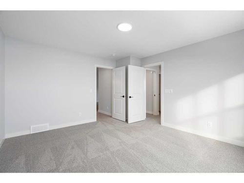 200 Precedence Hill, Cochrane, AB - Indoor Photo Showing Other Room