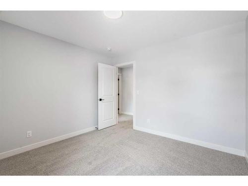 200 Precedence Hill, Cochrane, AB - Indoor Photo Showing Other Room