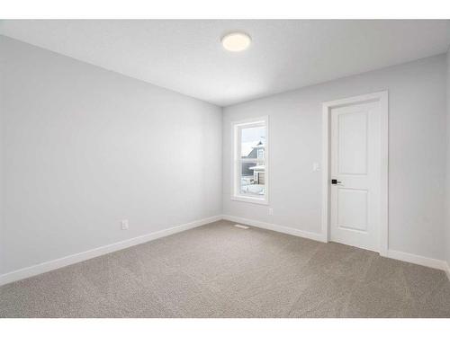 200 Precedence Hill, Cochrane, AB - Indoor Photo Showing Other Room