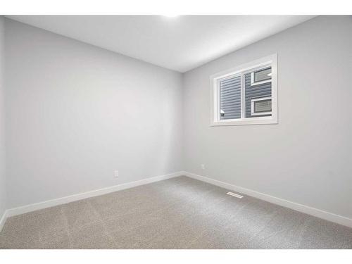 200 Precedence Hill, Cochrane, AB - Indoor Photo Showing Other Room