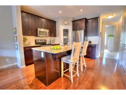 18 Nolanfield Lane Nw, Calgary, AB - Indoor Photo Showing Kitchen With Stainless Steel Kitchen With Upgraded Kitchen