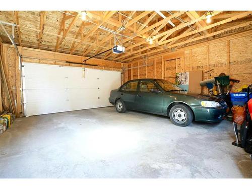 18 Nolanfield Lane Nw, Calgary, AB - Indoor Photo Showing Garage