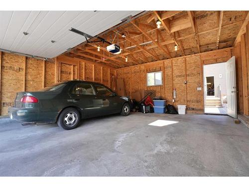 18 Nolanfield Lane Nw, Calgary, AB - Indoor Photo Showing Garage