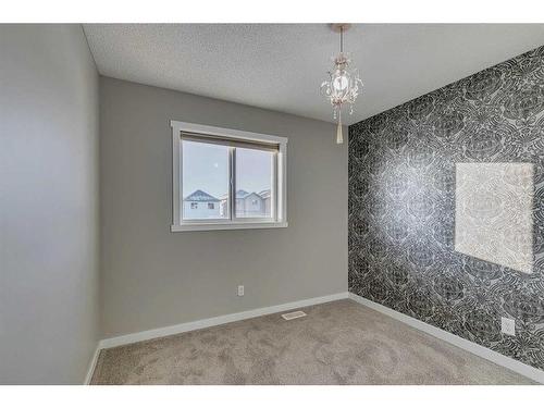 167 Silverado Plains Circle Sw, Calgary, AB - Indoor Photo Showing Other Room