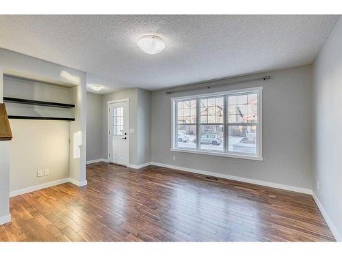 167 Silverado Plains Circle Sw, Calgary, AB - Indoor With Fireplace