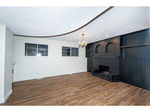 216 Whiteview Road Ne, Calgary, AB - Indoor With Fireplace