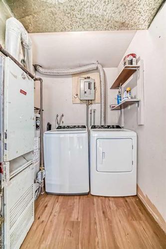 324-5404 10 Avenue Se, Calgary, AB - Indoor Photo Showing Laundry Room