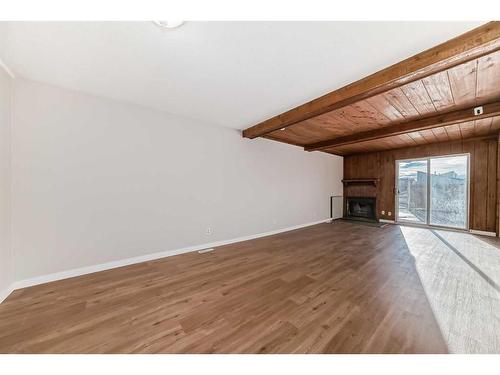 324-5404 10 Avenue Se, Calgary, AB - Indoor Photo Showing Other Room With Fireplace