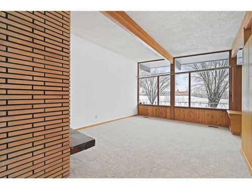 3903 Charleswood Drive Nw, Calgary, AB - Indoor With Fireplace