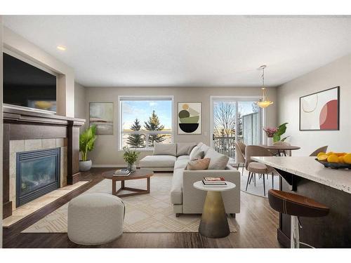 110 Brightoncrest Grove Se, Calgary, AB - Indoor Photo Showing Living Room With Fireplace