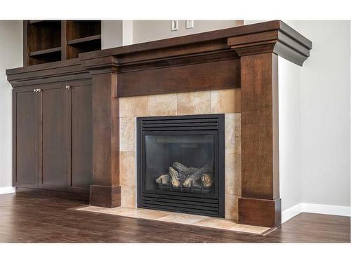 110 Brightoncrest Grove Se, Calgary, AB - Indoor Photo Showing Living Room With Fireplace