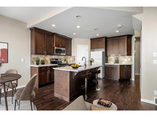 110 Brightoncrest Grove Se, Calgary, AB - Indoor Photo Showing Kitchen With Upgraded Kitchen