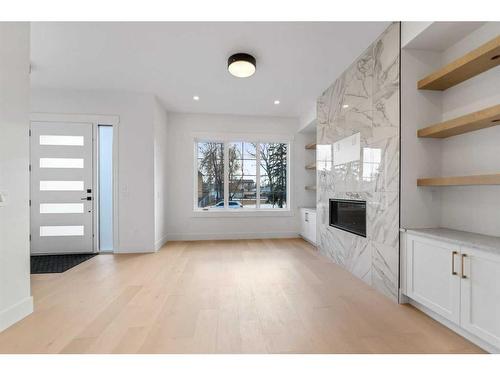 2424 53 Avenue Sw, Calgary, AB - Indoor With Fireplace