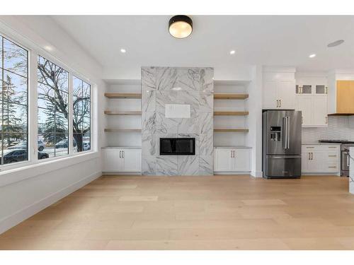 2424 53 Avenue Sw, Calgary, AB - Indoor With Fireplace