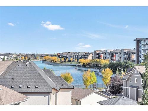 1403-11 Mahogany Row Se, Calgary, AB - Outdoor With Body Of Water With View