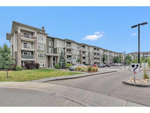 1403-11 Mahogany Row Se, Calgary, AB - Outdoor With Balcony With Facade