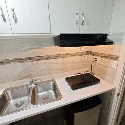 1224 Brightoncrest Green Se, Calgary, AB - Indoor Photo Showing Kitchen With Double Sink