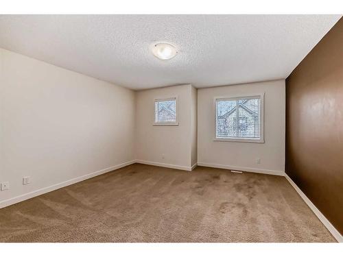 1703-2445 Kingsland Road Se, Airdrie, AB - Indoor Photo Showing Other Room