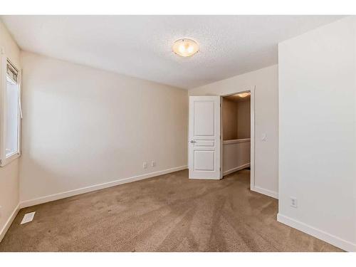 1703-2445 Kingsland Road Se, Airdrie, AB - Indoor Photo Showing Other Room