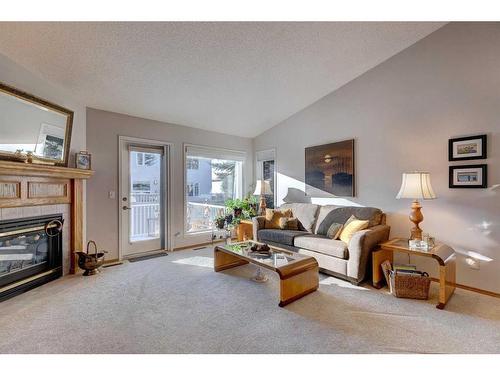 54 Douglasview Park Se, Calgary, AB - Indoor Photo Showing Living Room With Fireplace