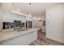 506-10060 46 Street Ne, Calgary, AB  - Indoor Photo Showing Kitchen With Stainless Steel Kitchen With Double Sink With Upgraded Kitchen 