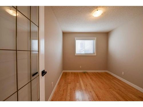 8 Arbour Glen Close Nw, Calgary, AB - Indoor Photo Showing Other Room