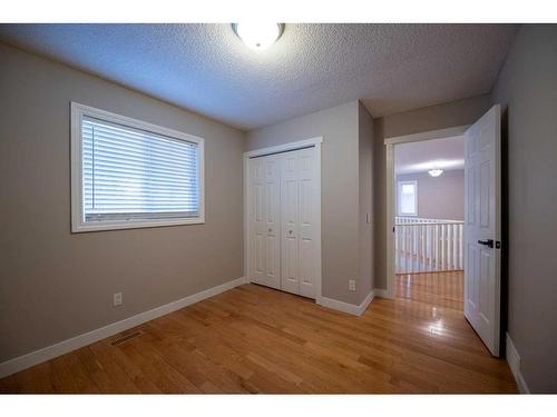 8 Arbour Glen Close Nw, Calgary, AB - Indoor Photo Showing Other Room