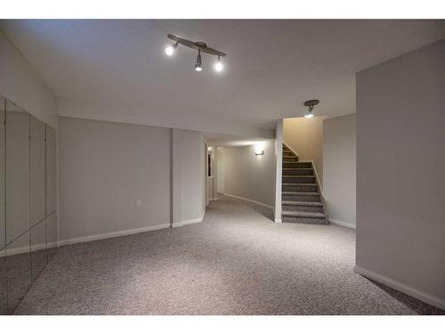 8 Arbour Glen Close Nw, Calgary, AB - Indoor Photo Showing Other Room