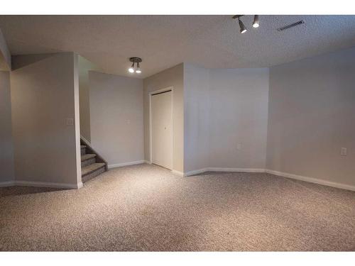 8 Arbour Glen Close Nw, Calgary, AB - Indoor Photo Showing Other Room