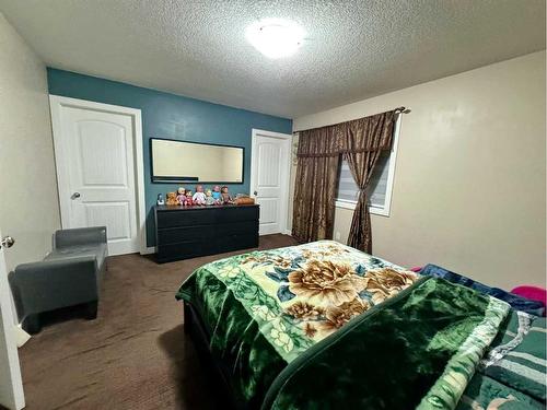 168 Saddlebrook Circle Ne, Calgary, AB - Indoor Photo Showing Bedroom