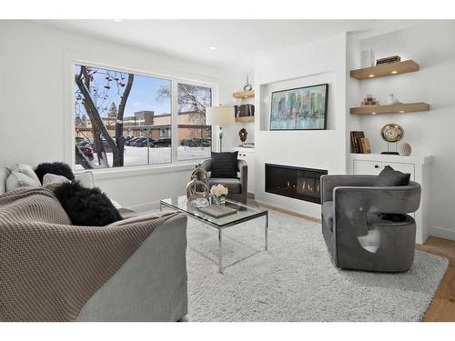 715 49 Avenue Sw, Calgary, AB - Indoor Photo Showing Living Room With Fireplace