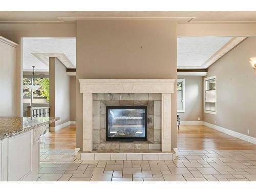 307 Wildwood Drive Sw, Calgary, AB - Indoor Photo Showing Living Room With Fireplace