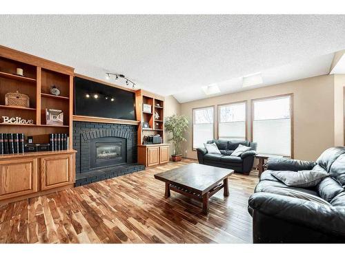 116 Mt Robson Circle Se, Calgary, AB - Indoor Photo Showing Living Room With Fireplace