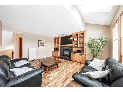 116 Mt Robson Circle Se, Calgary, AB - Indoor Photo Showing Living Room With Fireplace