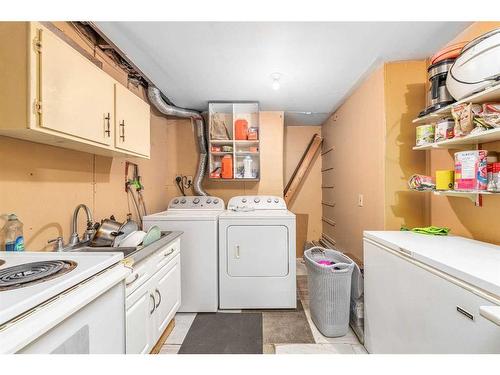 314 Olympia Crescent Se, Calgary, AB - Indoor Photo Showing Laundry Room