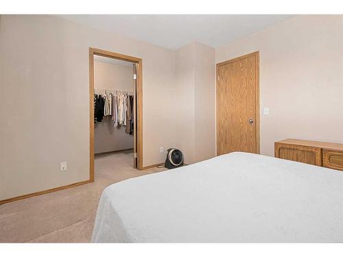 161 Country Hills Way Nw, Calgary, AB - Indoor Photo Showing Bedroom