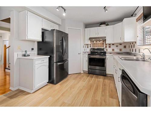 161 Country Hills Way Nw, Calgary, AB - Indoor Photo Showing Kitchen With Double Sink