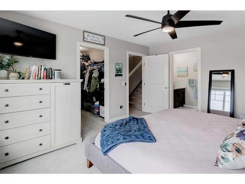 239 Sunset Point, Cochrane, AB - Indoor Photo Showing Bedroom