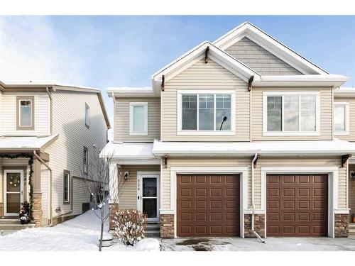 239 Sunset Point, Cochrane, AB - Outdoor With Facade