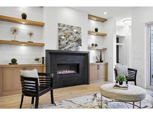 2112 Broadview Road Nw, Calgary, AB - Indoor Photo Showing Living Room With Fireplace