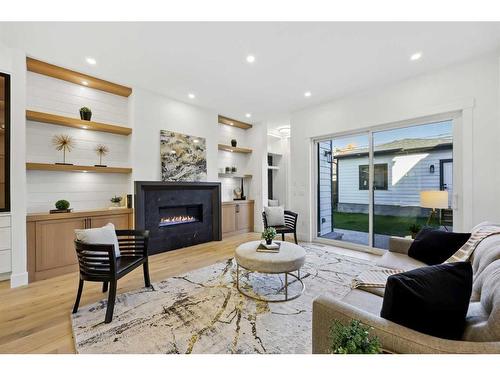 2112 Broadview Road Nw, Calgary, AB - Indoor Photo Showing Living Room With Fireplace