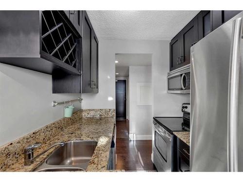 1506-733 14 Avenue Sw, Calgary, AB - Indoor Photo Showing Kitchen With Stainless Steel Kitchen With Double Sink