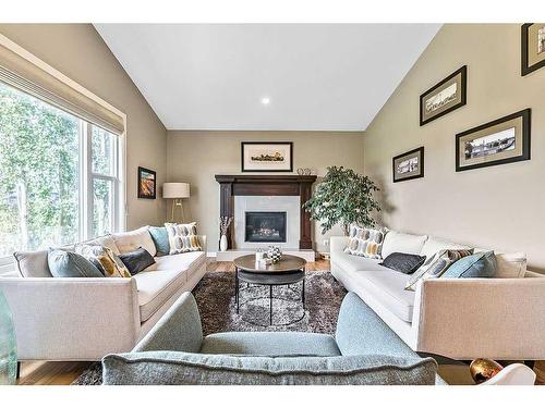 79 Cranbrook Way Se, Calgary, AB - Indoor Photo Showing Living Room With Fireplace