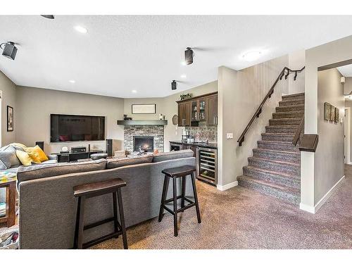 79 Cranbrook Way Se, Calgary, AB - Indoor Photo Showing Other Room With Fireplace