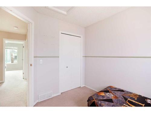 152 Martin Crossing Crescent Ne, Calgary, AB - Indoor Photo Showing Bedroom