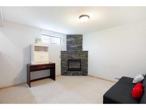 152 Martin Crossing Crescent Ne, Calgary, AB - Indoor With Fireplace