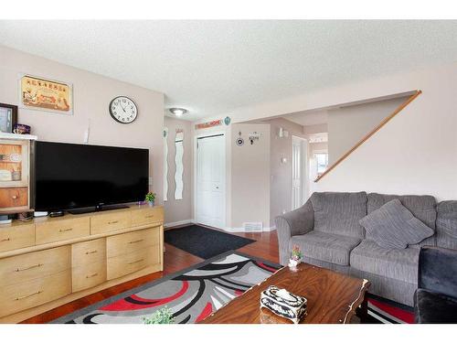 152 Martin Crossing Crescent Ne, Calgary, AB - Indoor Photo Showing Living Room