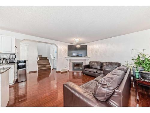 37 Somerside Crescent Sw, Calgary, AB - Indoor With Fireplace